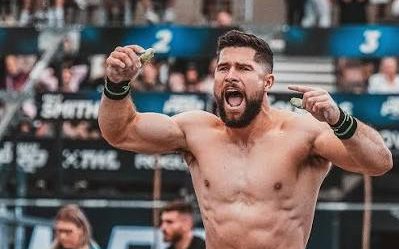 Bayley Martin shouting in celebration on a competition floor